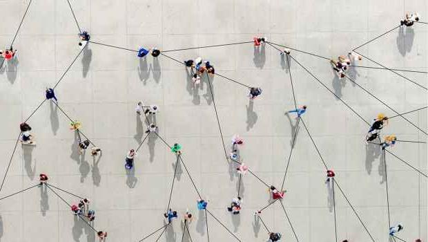 Aerial photo of people outside connected by lines